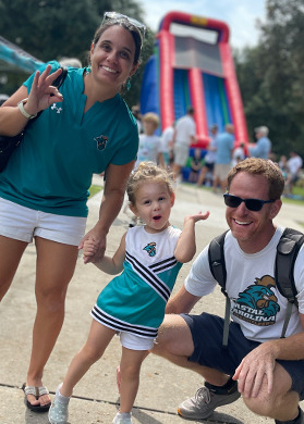 CCU alumni with silly cute girl at TEALgate