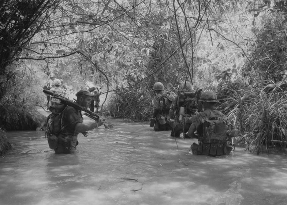 U.S. Marines of Compnay H, 2nd Battalion Regiment take to the water image, National Archives image