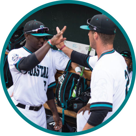 ESPN cameras caught the intricately choreographed handshake performed by CCU players Seth Lancaster and Josh Crump.