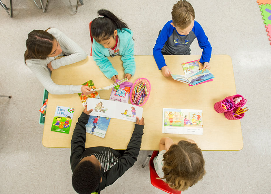 Students around Table in Elementary School Classroom image
