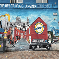 Peace Mural with Taxi Cab in Belfast Northern Ireland