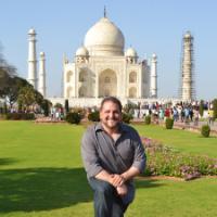 Matthew Gilbert standing in front of Taj Mahal