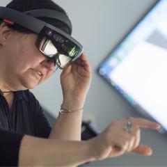 Sue Bergeron working with a Oculus VR lens