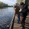 Two volunteers sample water at Conway Waterfront
