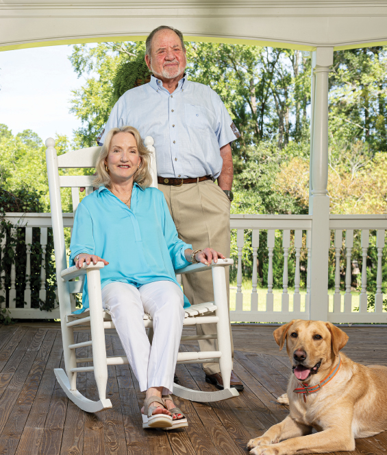 CCU Gupta College of Science benefactors David and Christy Douglas with their dog, Thor.