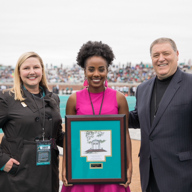 Left to right: CCU Executive Director of Alumni Relations Julie Cheney; CCU Outstanding Young Alumnus of the Year Sadara Shine; and CCU President David A. DeCenzo 
