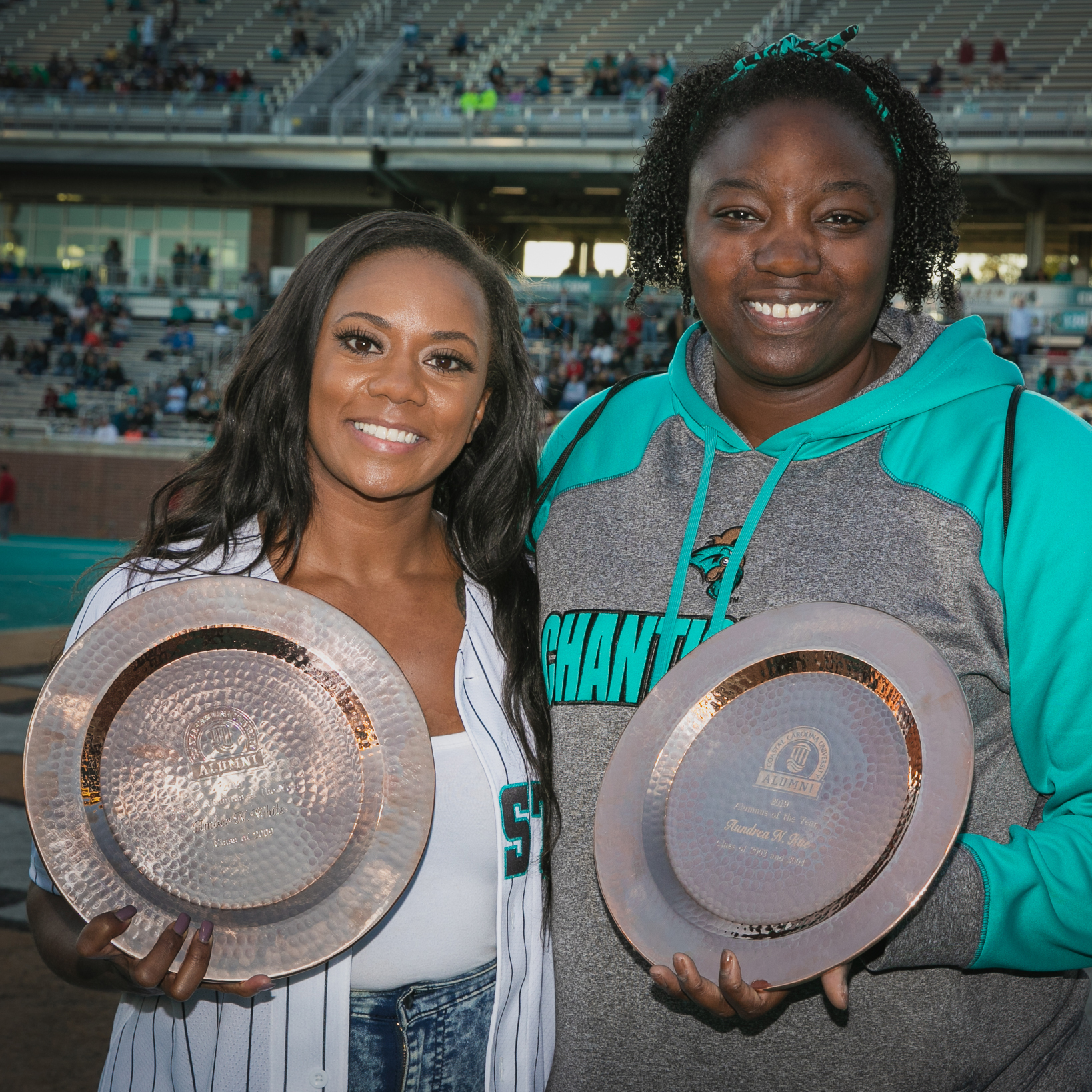 The CCU Alumnus of the Year honorees are Aundrea Rue '03 '04 (right), a teacher and foster parent, and Amber White '09, a senior lead auditor at Wells Fargo.