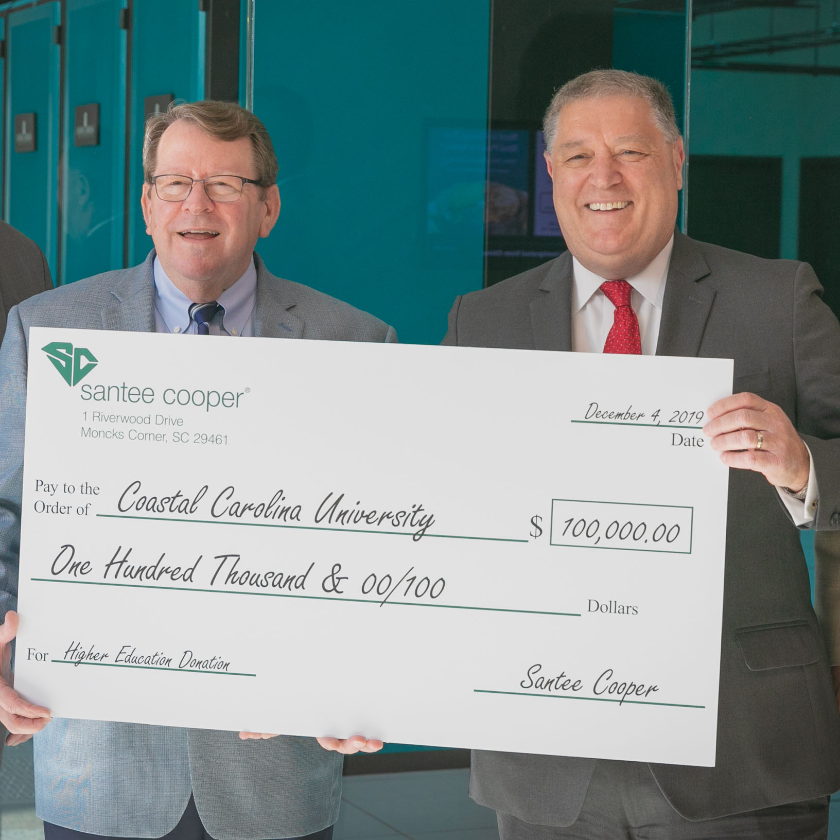 From left, Mark Bonsall, Santee Cooper president and CEO and David A. DeCenzo, CCU president.