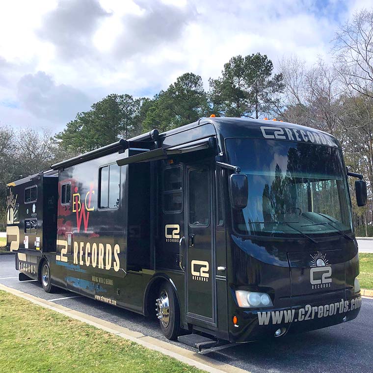 Marked by its artist wrapped tour bus and Airstream trailer converted into a state-of-the-art recording studio, C2 is on campus conducting their new contest.