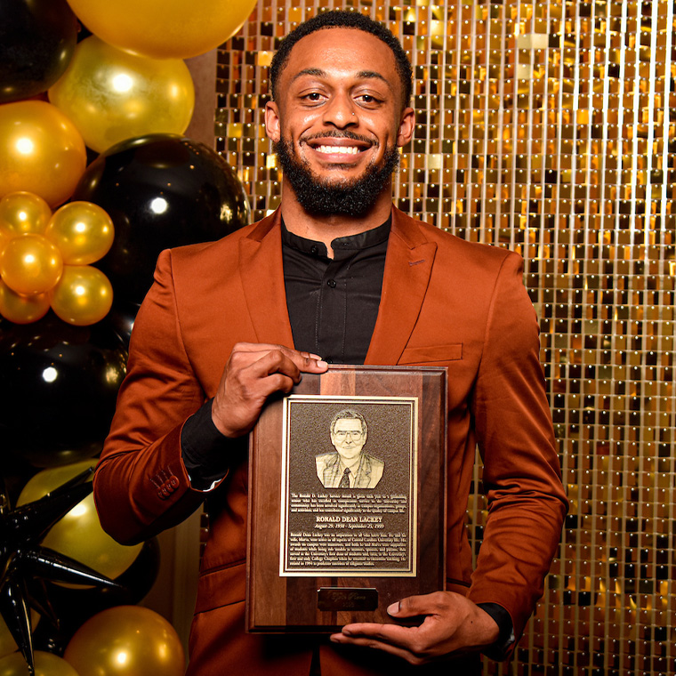 Tyrik Pierre was presented the Ronald D. Lackey Service Award