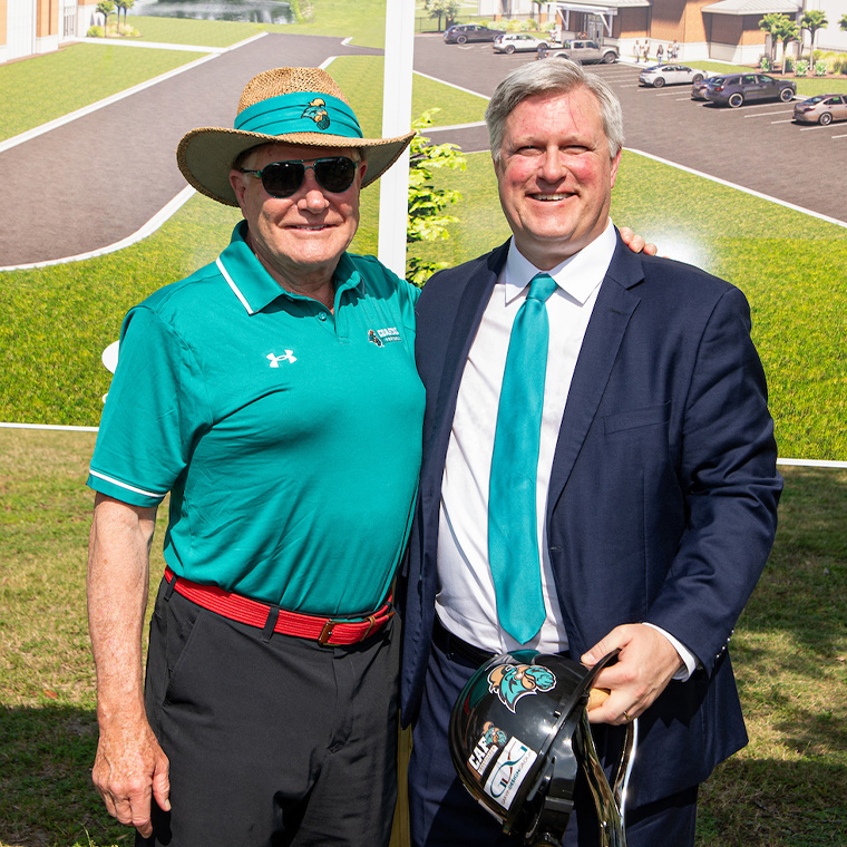 Joe Moglia, chair of athletics and executive director for football, and Matt Hogue, vice president for intercollegiate athletics and University recreation.