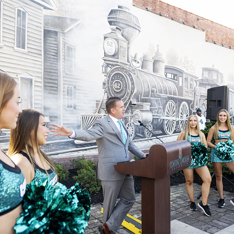 CCU President Michael T. Benson addressed the crowd prior to the store opening.