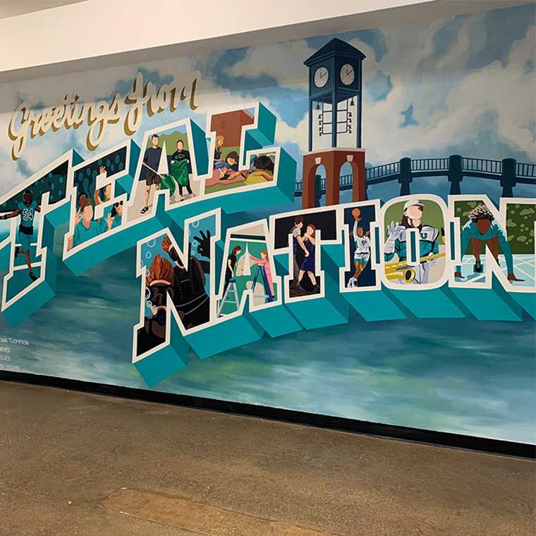 The new mural, located in Hicks Dining Hall, was created to capture the true essence of the CCU experience.